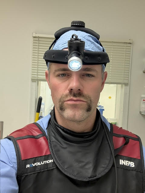 Dr. Behrens in surgical headlamp